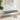 Button-tufted velvet bench, gray cushion with gold hairpin legs—side view