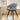 Gray swivel plastic chair with ribbed padded back, fabric seat, and black legs.