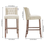 Set of 2 linen bar stools, light cream, button-tufted backs and wooden legs