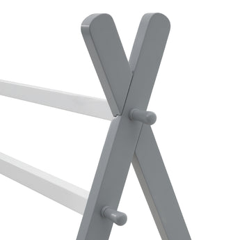 Close-up of grey angled supports with round dowel fasteners on the bed frame