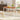 Rectangular wooden dining table, warm brown top with white tapered legs
