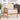 Beige cushioned upholstered rattan armchair with light wood frame and wide seat arms