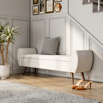 Light grey upholstered storage bench with rounded arms and wooden legs