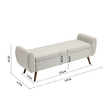 Light grey upholstered storage bench with padded lid and wooden legs