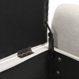Beige linen storage bench interior with black hinge hardware and latch