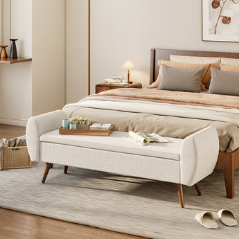 Beige storage bench with tufted cushion top and wooden legs