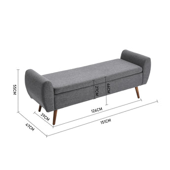 Grey upholstered storage bench with padded backrests and tapered wooden legs