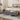 Grey linen upholstered storage bench with hinged lid, wooden legs, and cushioned top