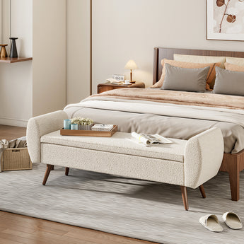 Beige faux fur storage bench with tufted top and wooden legs