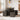Dining table with 4 storage stools, dark wood frame and black cushioned seat tops.