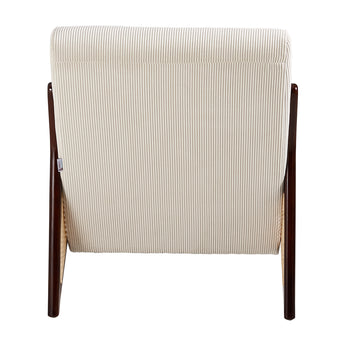 Back view of cream corduroy armchair, rattan sides visible, dark wood legs