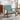 Green corduroy armchair with rattan armrests, dark wood frame, wide seat and backrest