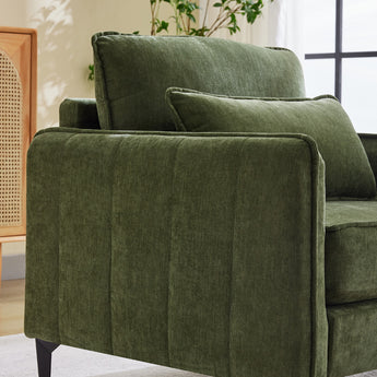 Green chenille armchair with padded seat, backrest, and lumbar cushion