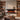 Wall-mounted electric fireplace with dark surround and bright burning flame display