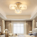 Round acrylic LED semi-recessed ceiling light with chrome ring and frosted shades