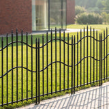 Black metal decorative garden fence panel with arched wavy top and spear finials