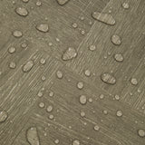 Waterproof vinyl floor tile with raised drop beads texture on dark gray woodgrain