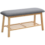Bamboo shoe storage bench with gray upholstered seat and lower slatted shoe rack
