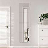 Tall rectangular acrylic mirror tile panel with vertical seam lines