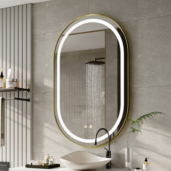 Wall-mounted oval LED bathroom mirror with glowing ring and slim gold frame