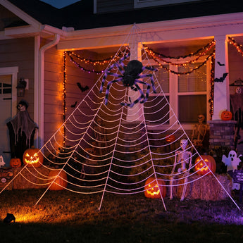 Purple and black Halloween spider decoration with web spanning the front porch