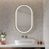 Wall-mounted oval LED bathroom mirror with white LED ring and touch buttons