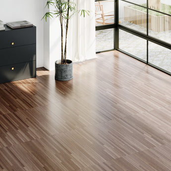 Self-adhesive wood-grain PVC plank flooring in light gray-brown tone
