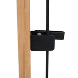 Black wrought iron gate latch bracket on vertical post with visible mounting hardware.