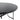 Black tabletop corner and curved metal support beneath round outdoor dining table