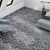 Dark gray marble-look peel-and-stick vinyl floor tiles with white veining