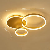 Gold 3-ring LED ceiling light with three circular loops and glowing white LED rings