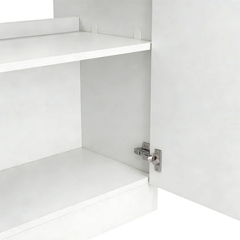 White bathroom vanity cabinet with open doors, showing interior storage compartment and hinges