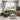 Green sofa with chaise and cup holder, rivet-studded armrests and plush cushions