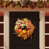 Halloween decorative wreath with pumpkins, leaves, and fall flowers