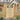Wooden garden fence gate with horizontal slat panel and top grille, light timber.
