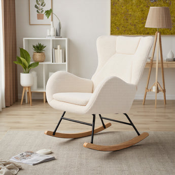 Cream lambswool rocking chair with high back, padded seat, and wood runners on black frame.