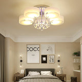 Ceiling light with four frosted acrylic shades and central chrome crystal cluster