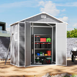 Gray plastic storage shed with double doors open, shelves holding garden tools