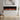 60-inch electric fireplace in wall opening, black frame with burning flame effect