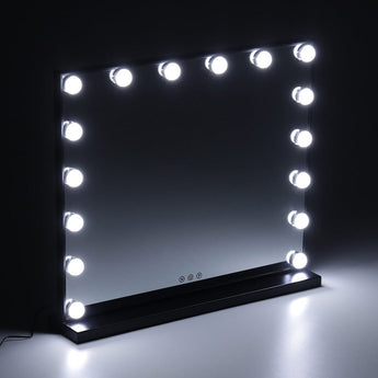 Rectangle LED makeup mirror with black frame and bright white bulbs glowing around edges