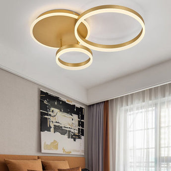 Gold 3-ring LED ceiling light with two large loops and a small bottom loop
