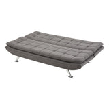 Dark grey linen sofa bed folded out flat, tufted cushions and chrome legs