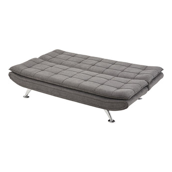 Dark grey linen sofa bed folded out flat, tufted cushions and chrome legs