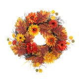 Halloween autumn wreath with orange and yellow flowers and brown leaf accents