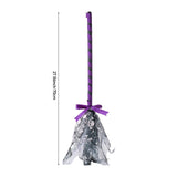 Purple-striped Halloween wand with silver tulle pouch and purple ribbon bow
