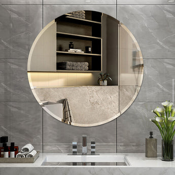 Circular frameless wall-mounted mirror with clear reflective surface