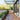 Self-adhesive wood-grain PVC plank flooring, reddish-brown tone for patio floor