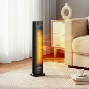 Portable electric heater, black tower style with glowing heat element and control panel