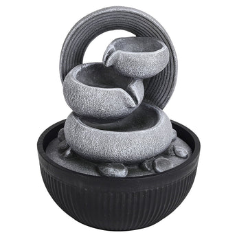 Resin tabletop fountain with swirling gray stone accents and round black basin base