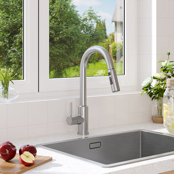 Stainless steel kitchen faucet with single handle, chrome finish and arched spout